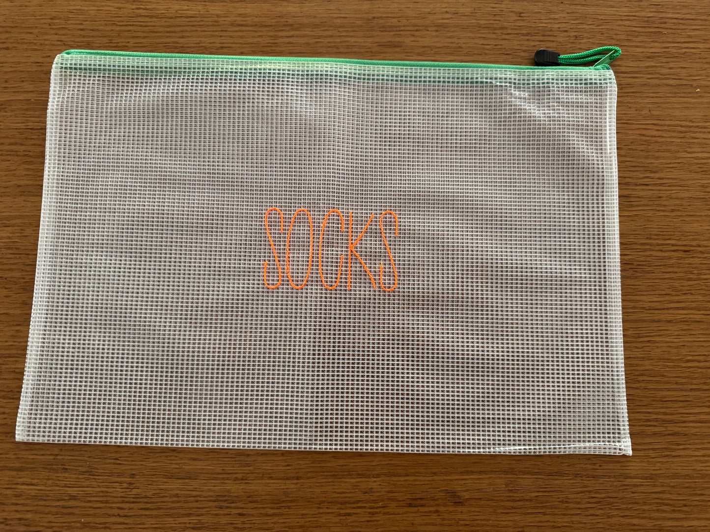 Mesh zip pouch organizers