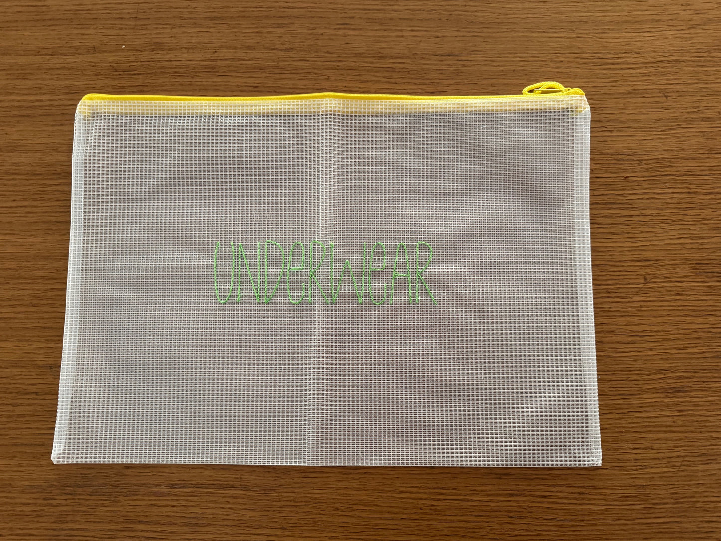 Mesh zip pouch organizers